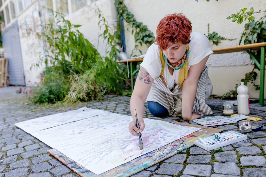 Malen in der Frohschammer-Straße. Foto: MVHS/ Loredana LaRocca